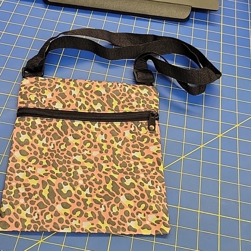 Crossbody Pink Leopard 8" x 9" Polyethylene Zip in the Front